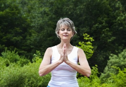 Senior woman meditating