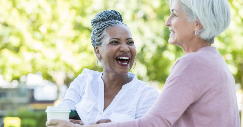 Two senior woman having coffee